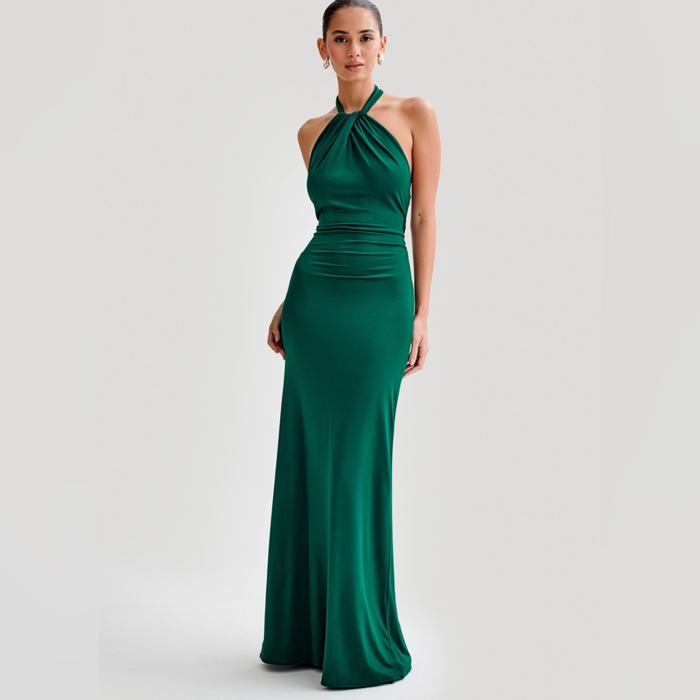 Long green dress new unworn. Very stretchy fits 10-12